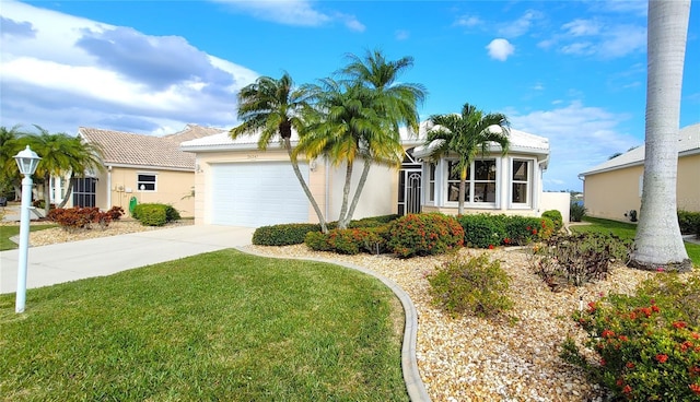 single story home featuring a front lawn and a garage