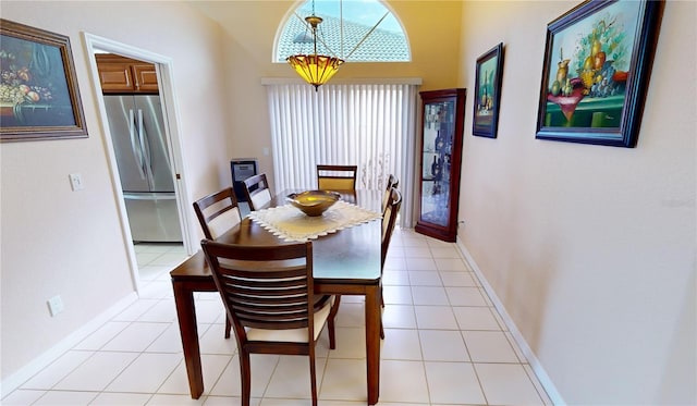 dining room with light tile patterned flooring