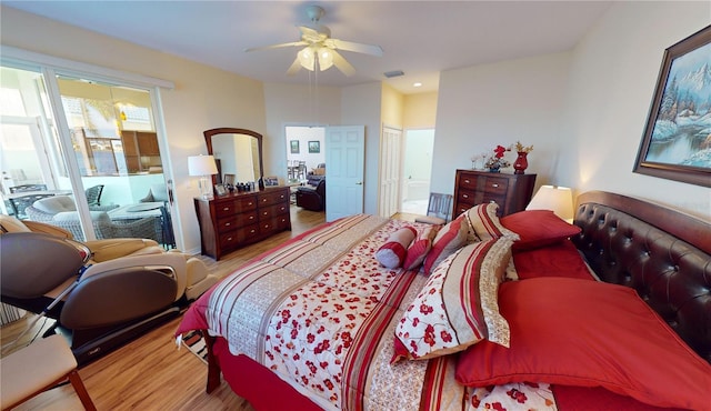 bedroom featuring a closet, ceiling fan, and light hardwood / wood-style flooring