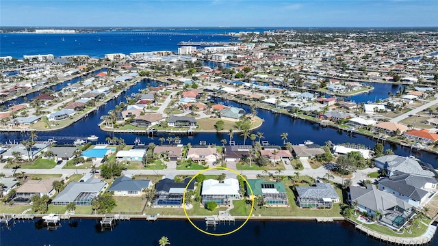 drone / aerial view featuring a water view