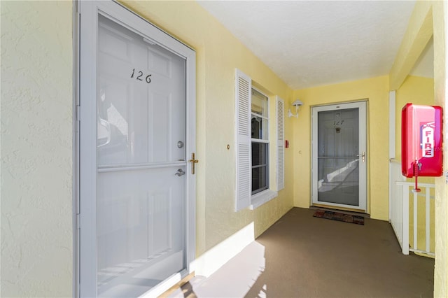 4000 Bal Harbor Blvd Unit 126, Punta Gorda, FL 33950 - doorway to property featuring stucco siding