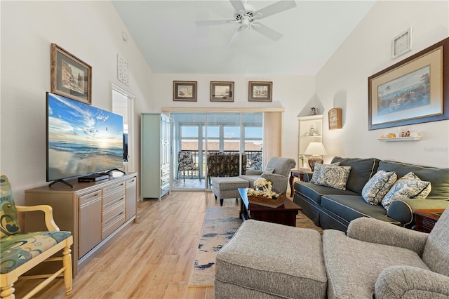 4000 Bal Harbor Blvd Unit 126, Punta Gorda, FL 33950 - living room with lofted ceiling, a ceiling fan, and light wood-style flooring
