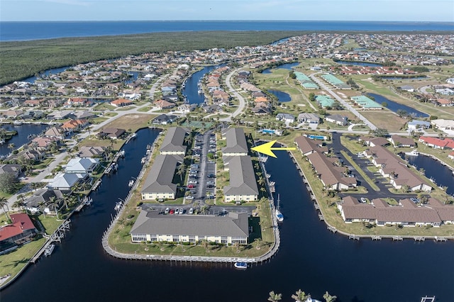 bird's eye view with a water view