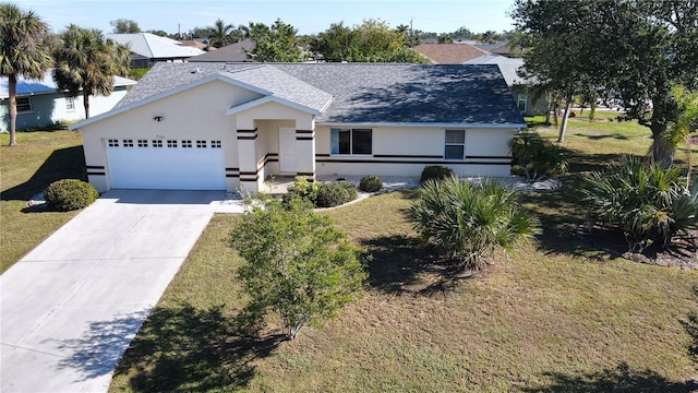 ranch-style house featuring a garage and a front yard