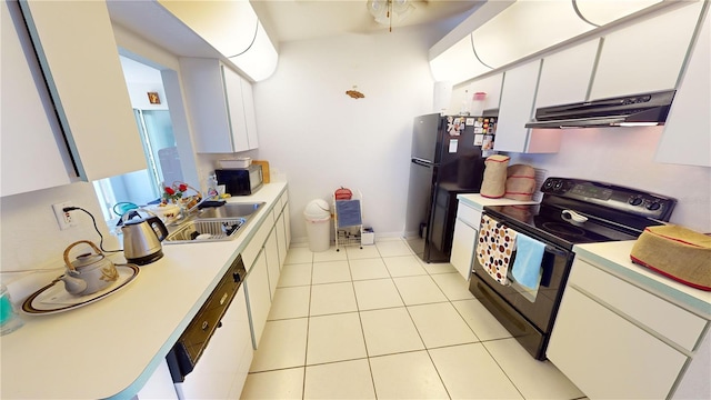 kitchen featuring white cabinets, sink, light tile patterned floors, and black appliances