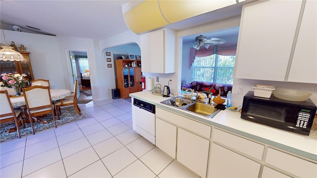 kitchen with white cabinetry, sink, and white dishwasher