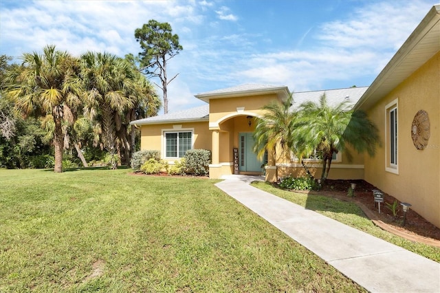 view of front of house with a front lawn