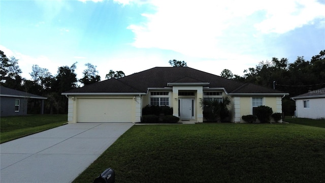 ranch-style home with a front yard and a garage