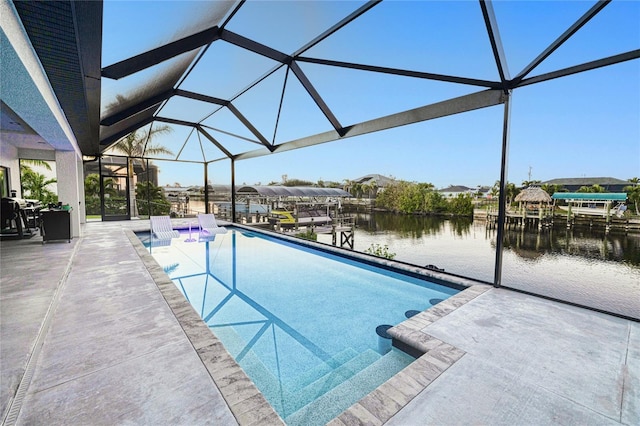 view of swimming pool featuring a lanai, a dock, a water view, and a patio