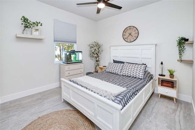 bedroom with ceiling fan and light wood-type flooring