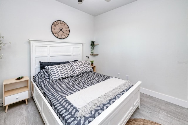 bedroom featuring ceiling fan and hardwood / wood-style floors