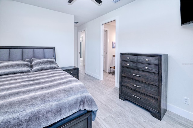 bedroom featuring ceiling fan and light hardwood / wood-style floors