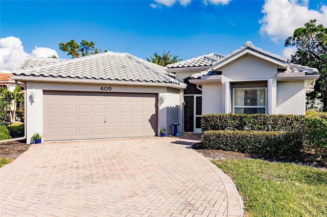 view of front of property with a garage