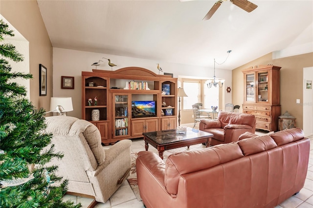 living room with ceiling fan with notable chandelier, light tile patterned floors, and lofted ceiling