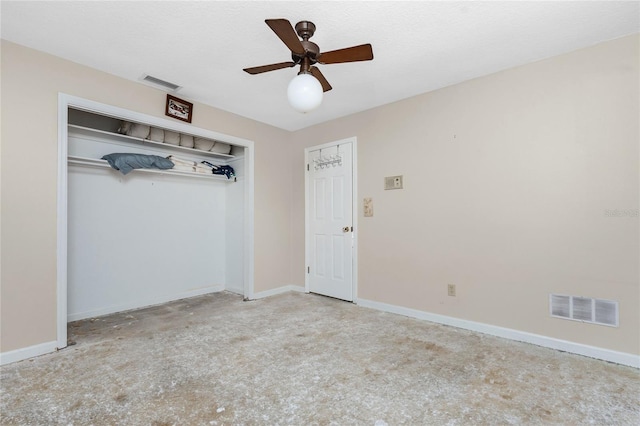 unfurnished bedroom with a closet and ceiling fan