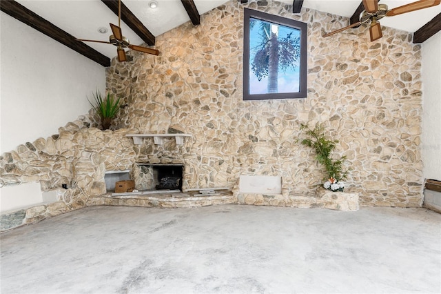 unfurnished living room with a fireplace, lofted ceiling with beams, concrete flooring, and ceiling fan