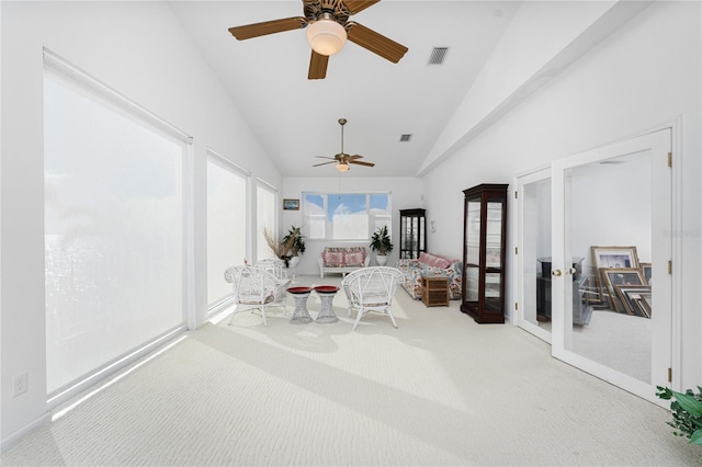 sunroom with french doors and lofted ceiling