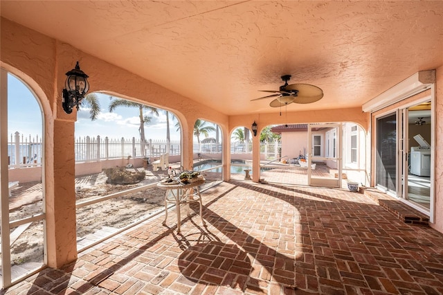 view of patio / terrace featuring ceiling fan