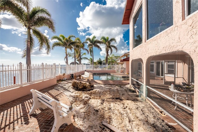 view of yard with a fenced in pool and a patio