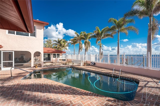 view of pool featuring a patio