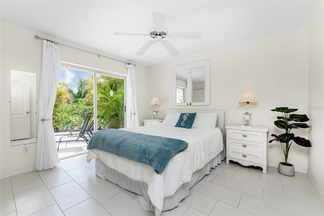 tiled bedroom with access to exterior and ceiling fan