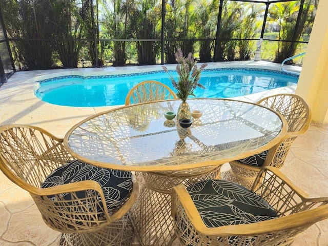 view of pool featuring a patio