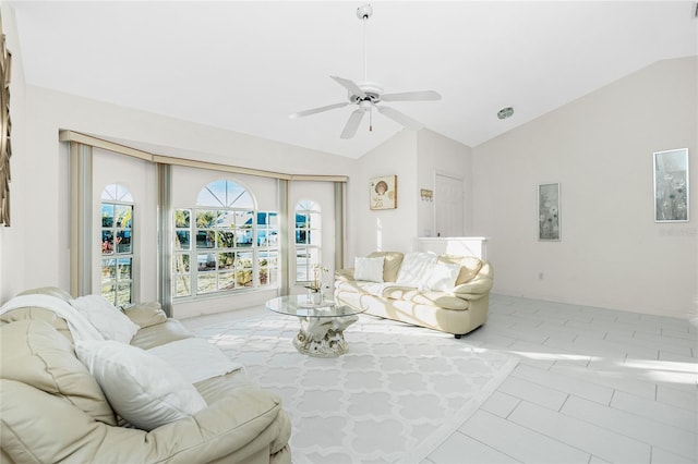 tiled living room with plenty of natural light, lofted ceiling, and ceiling fan