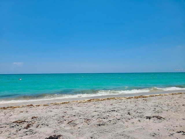 property view of water featuring a view of the beach