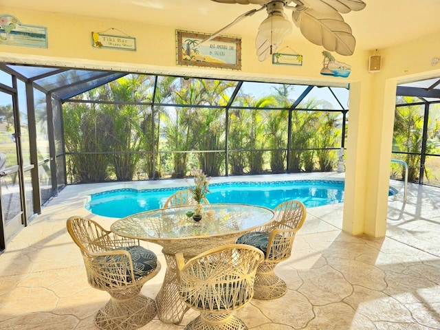 view of pool with a lanai and a patio area