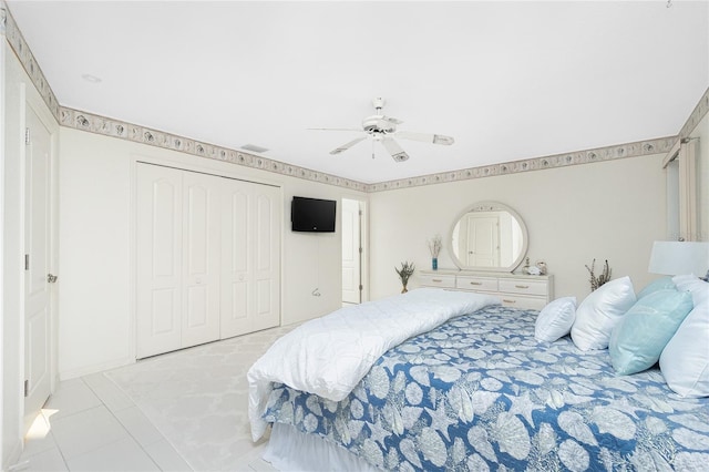 bedroom with a closet and ceiling fan