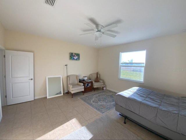 bedroom featuring ceiling fan and light tile patterned floors