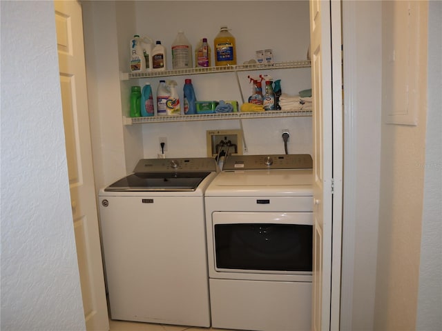 laundry area featuring separate washer and dryer