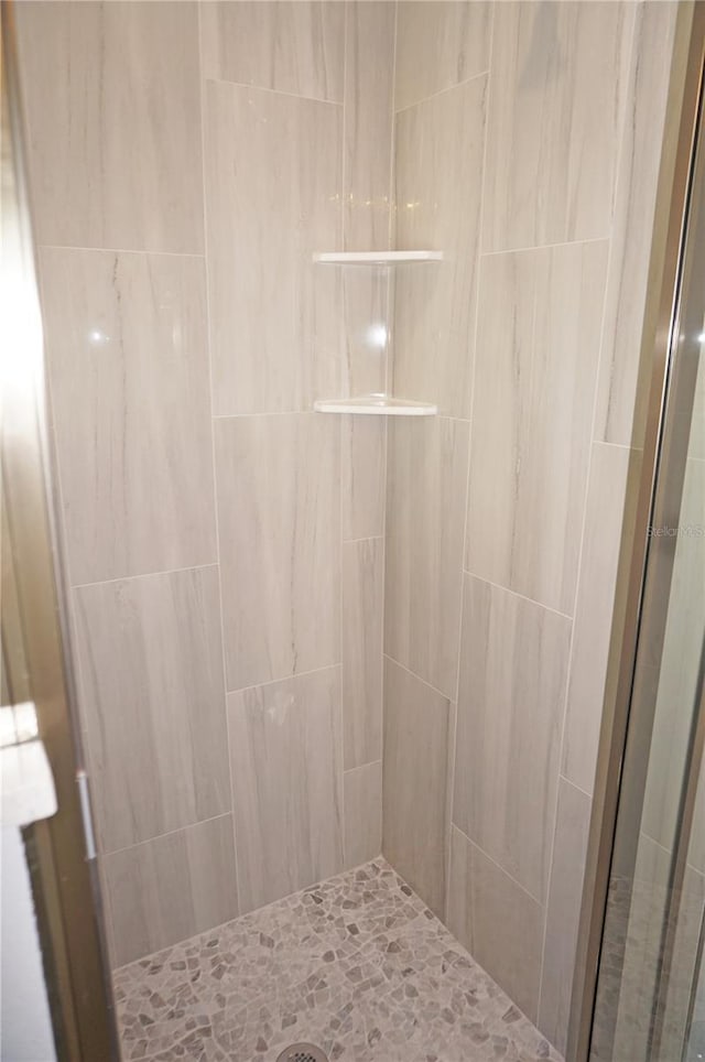 bathroom with an enclosed shower