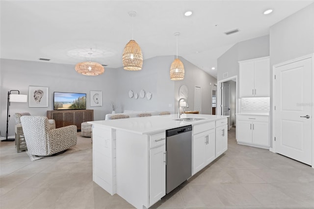 kitchen featuring white cabinetry, sink, an island with sink, and dishwasher