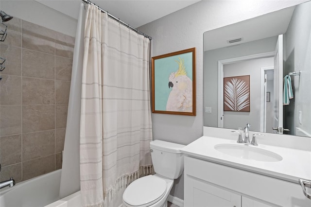 full bathroom with vanity, toilet, and shower / bath combo with shower curtain