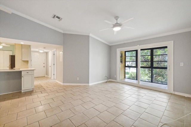 unfurnished room with ceiling fan, crown molding, and light tile patterned flooring