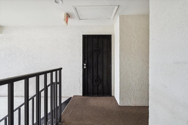 entrance to property with a balcony