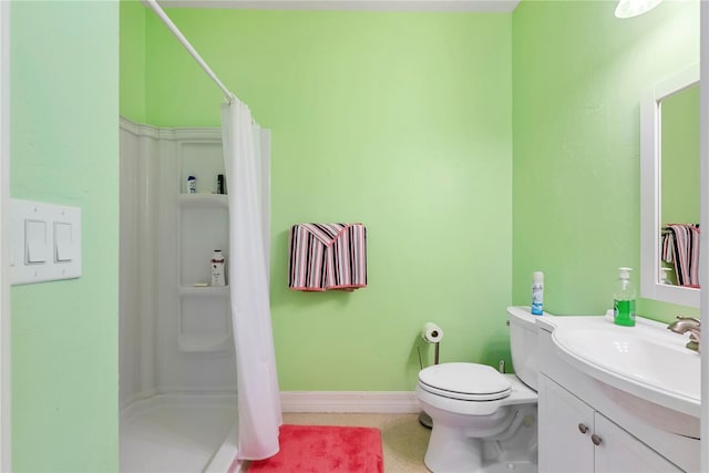 bathroom featuring vanity, toilet, and walk in shower