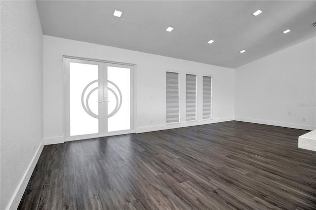 interior space with french doors and dark hardwood / wood-style floors