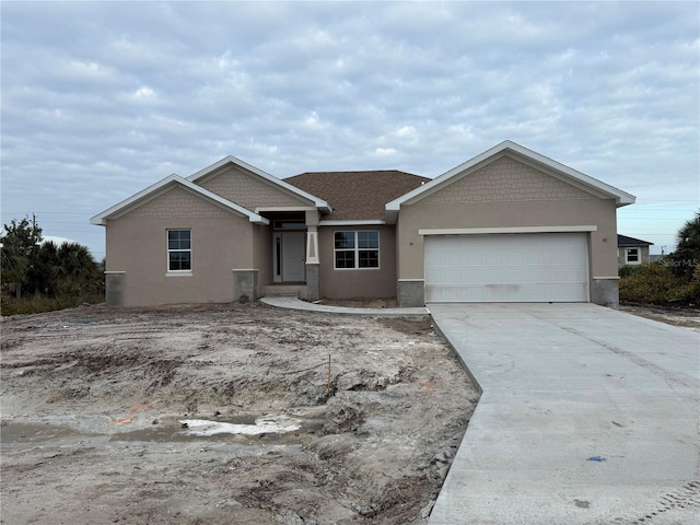 view of front of home with a garage