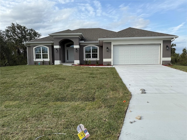 single story home featuring an attached garage, concrete driveway, roof with shingles, stucco siding, and a front lawn