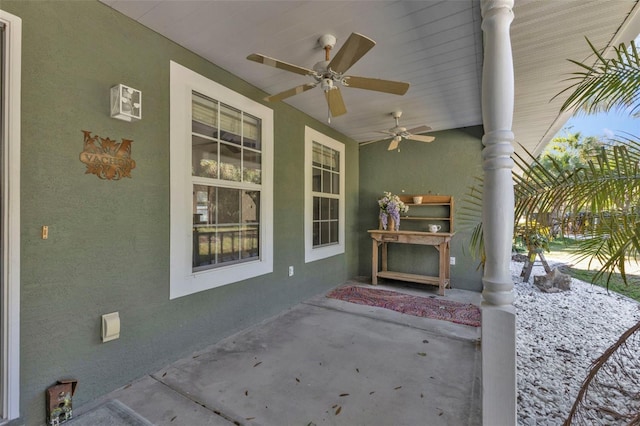 view of patio / terrace featuring covered porch and ceiling fan