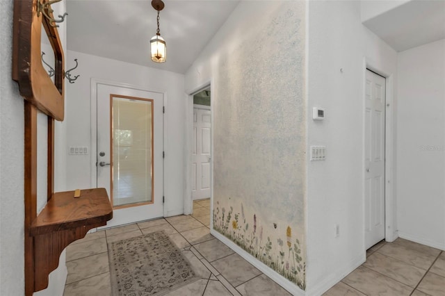 hallway featuring light tile patterned flooring