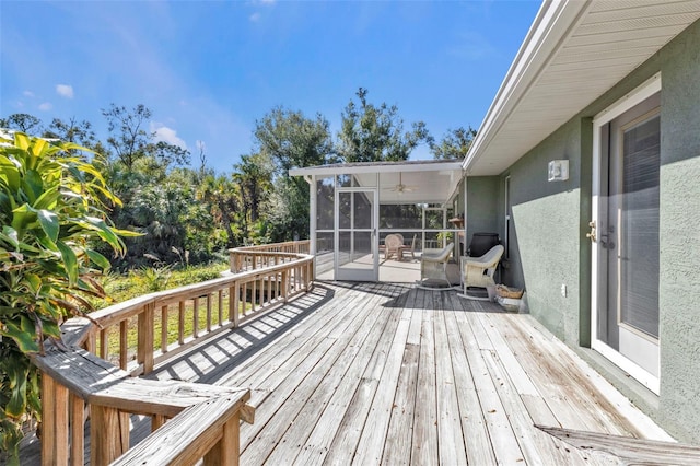 1811 Music Ln, North Port, FL 34286 - wooden deck featuring a sunroom and ceiling fan