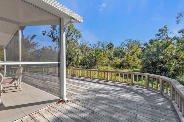 1811 Music Ln, North Port, FL 34286 - wooden deck with view of wooded area