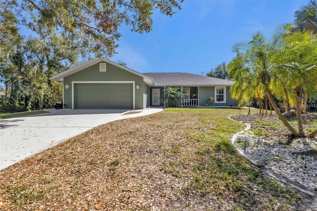 ranch-style house with a garage and a front yard