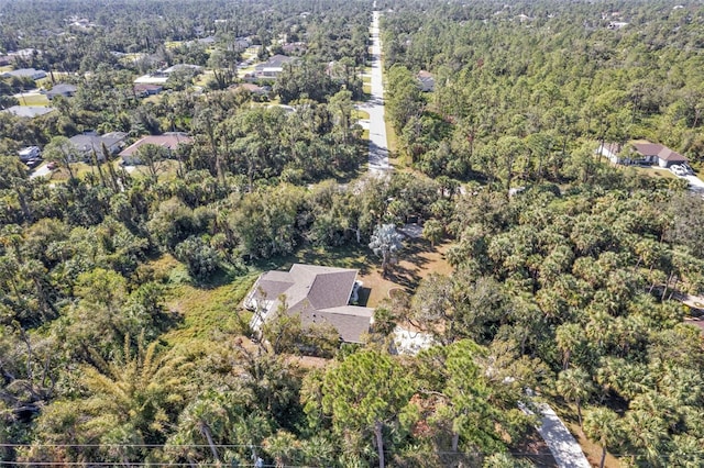 1811 Music Ln, North Port, FL 34286 - aerial view of property and surrounding area featuring a heavily wooded area