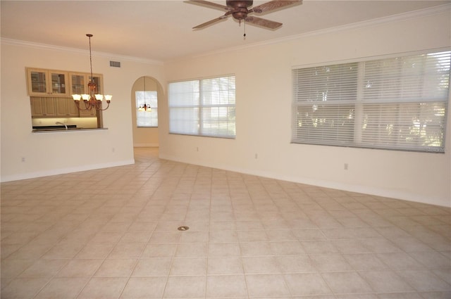 unfurnished room with ceiling fan with notable chandelier, ornamental molding, and light tile patterned floors