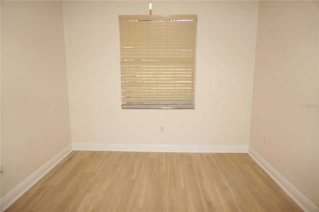 spare room featuring hardwood / wood-style floors