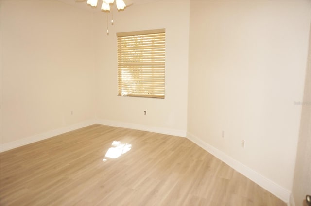 spare room with ceiling fan and light hardwood / wood-style floors